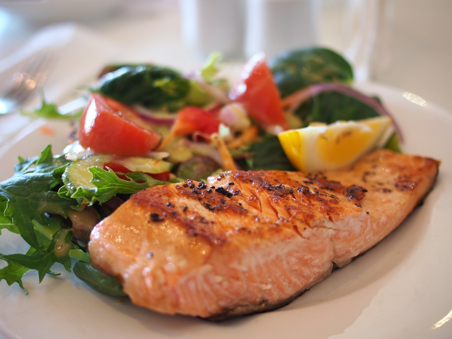 picture of salmon on plate with veggies