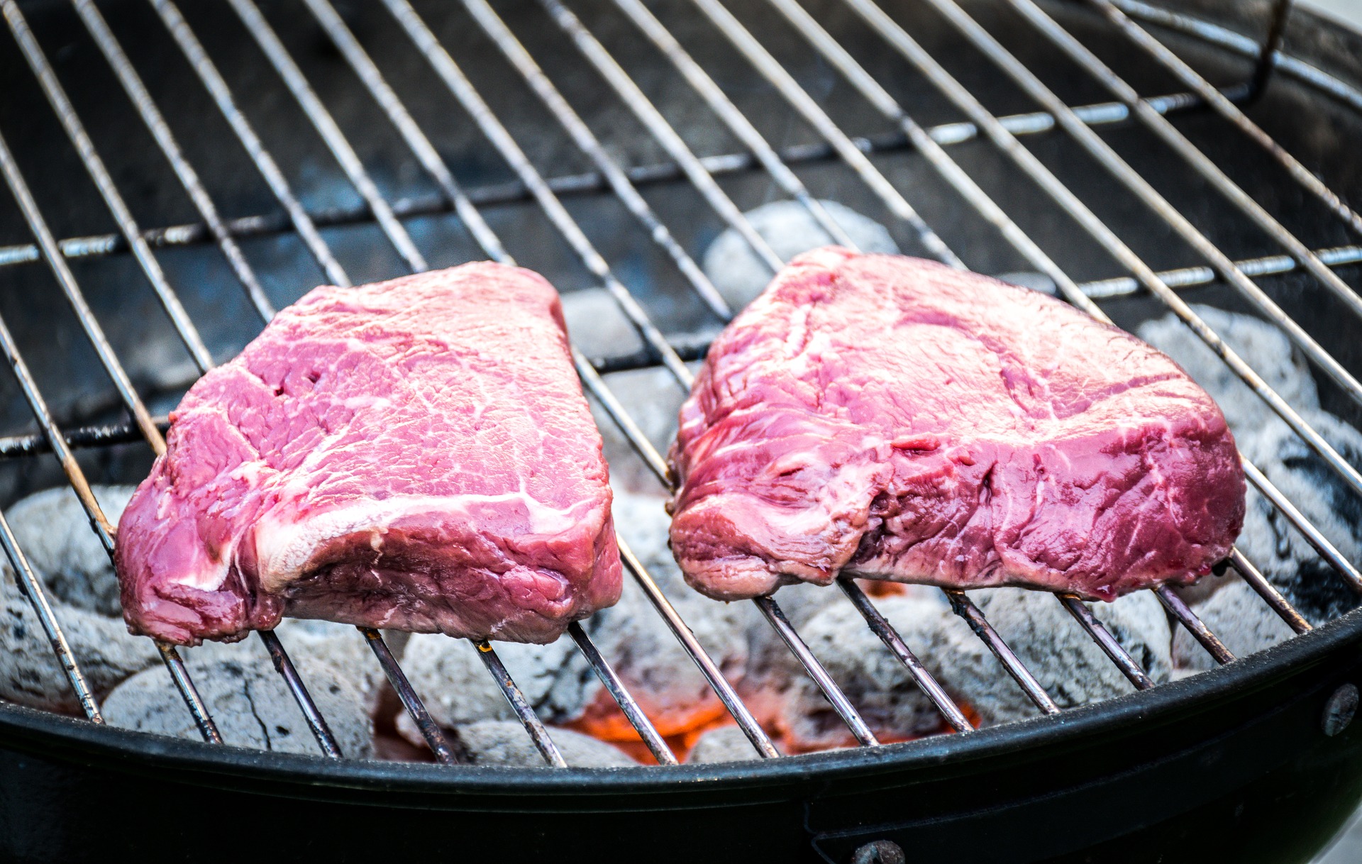 picture of meat on charcoal smoker grill
