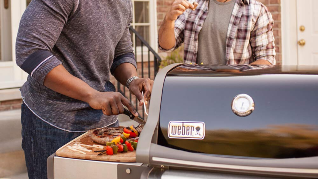 picture of men using weber spirit grill